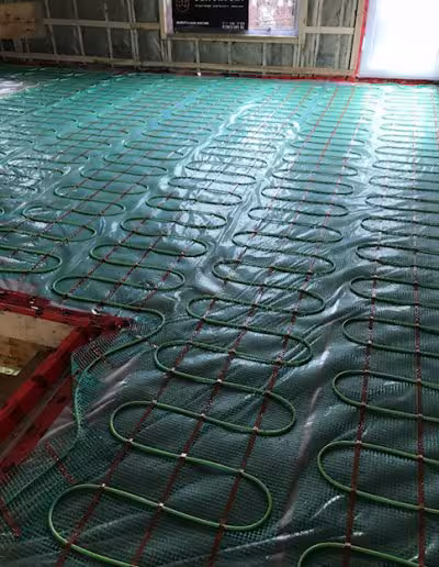 Système de plancher chauffant dans salle de bain